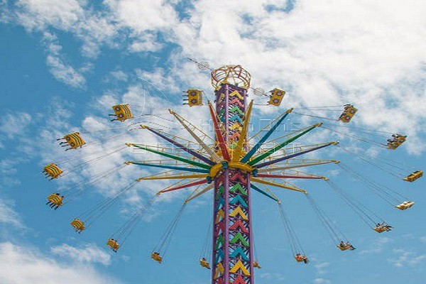 flying tower ride in amusement park