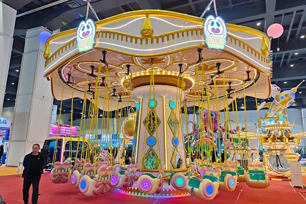 Dinis rabbit theme swing ride at expo